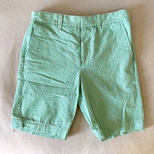 Green and white seersucker shorts.
